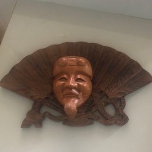 Wooden mask. Wall decoration